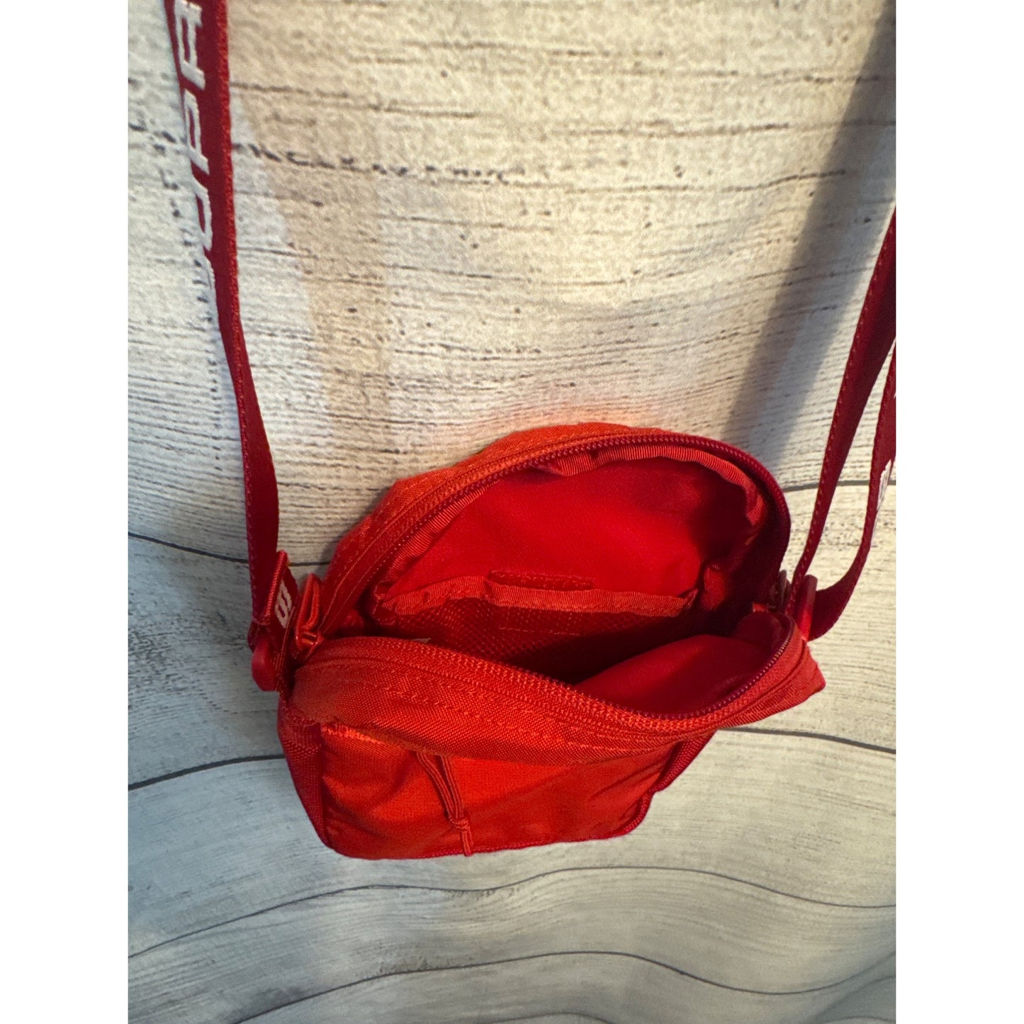 NWOT Supreme Red Crossbody Bag With Adjustable Strap & Multiple Compartments