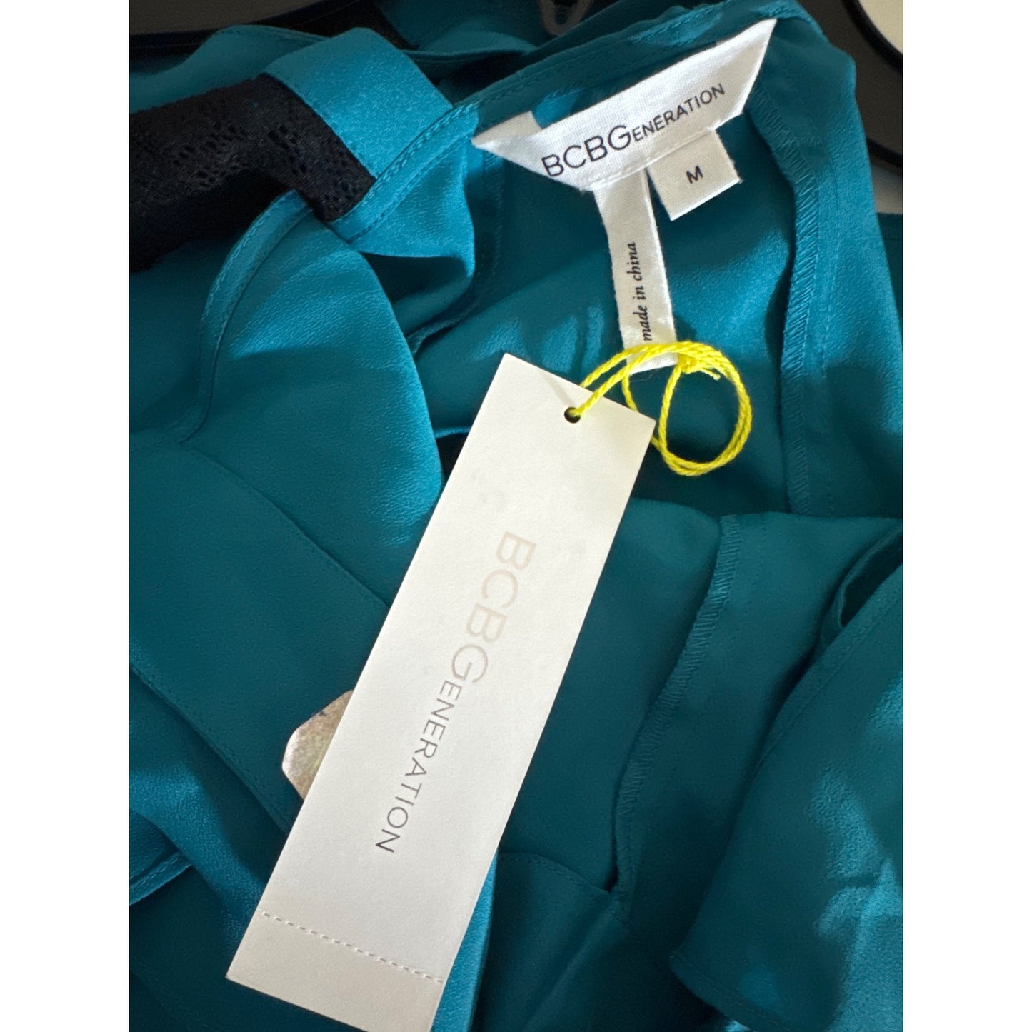 NWT BCBGeneration Teal Ruffled Sleeveless Blouse with Lace Back Size M