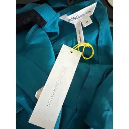 NWT BCBGeneration Teal Ruffled Sleeveless Blouse with Lace Back Size M