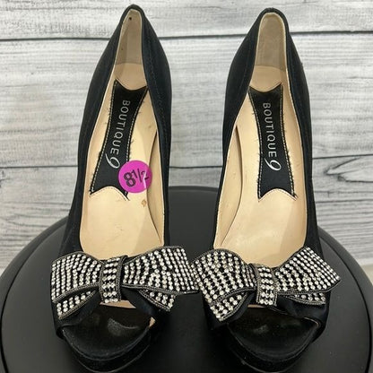 Black silk rhinestone bow pumps