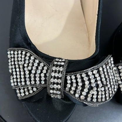 Black silk rhinestone bow pumps